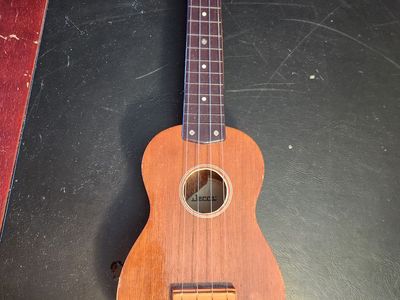 Antique 1960's Decca Soprano Ukulele, Made of Mahogany in N.Y., great shape, sounds and plays beautifully.