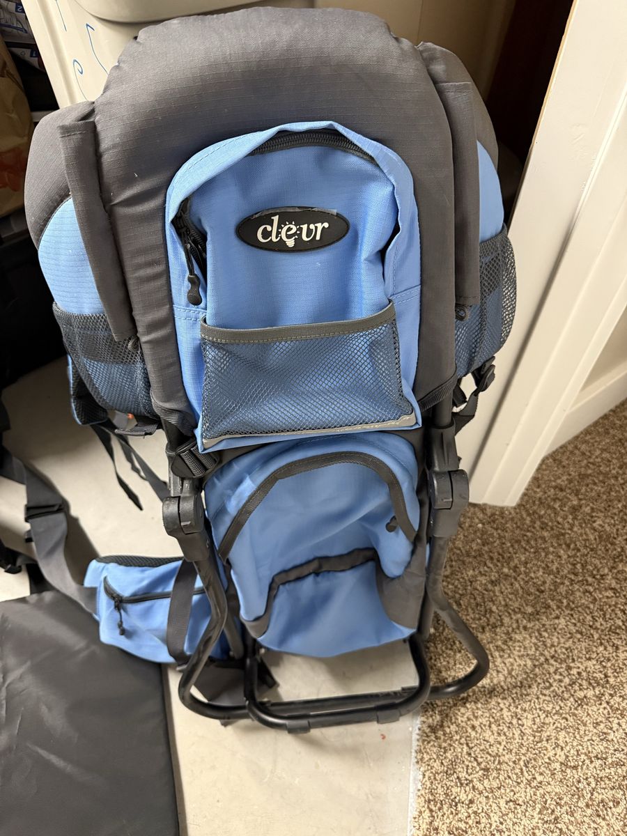 Kid carrying backpack