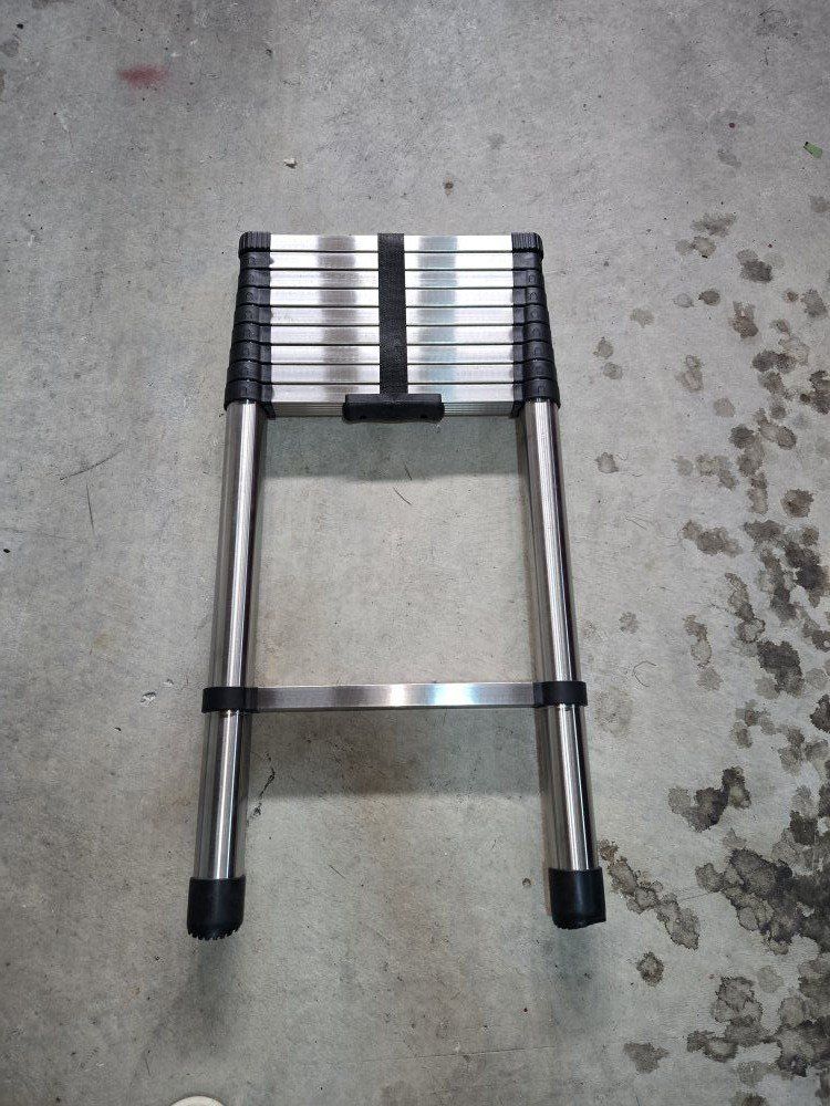 12.5ft telescoping ladder brand new