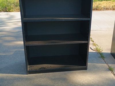 set of 2 black shelving units