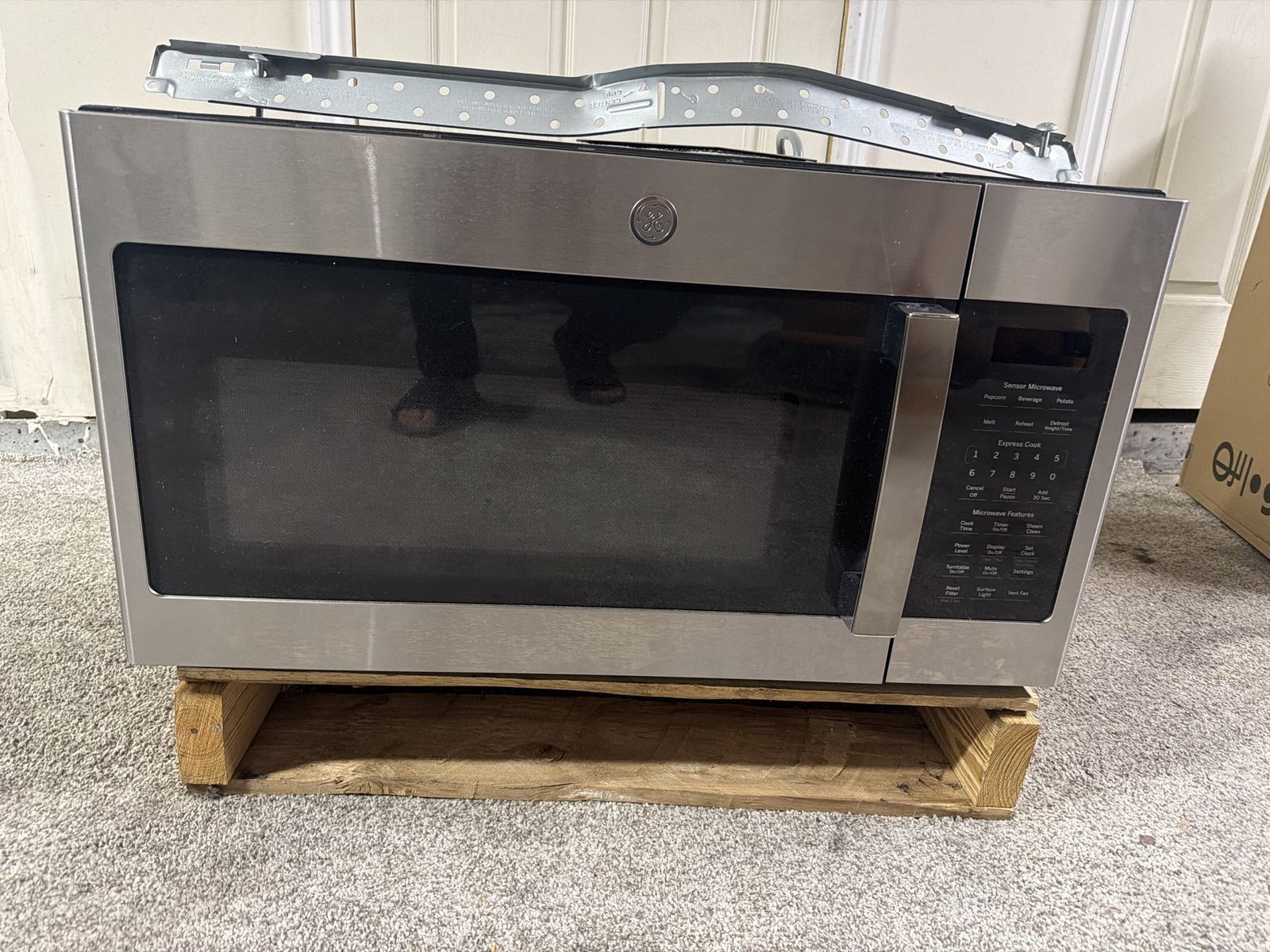 Brand new GE above the range micrweve