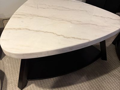 Triangular White Marble Coffee Table with Dark Wood Base and Shelf
