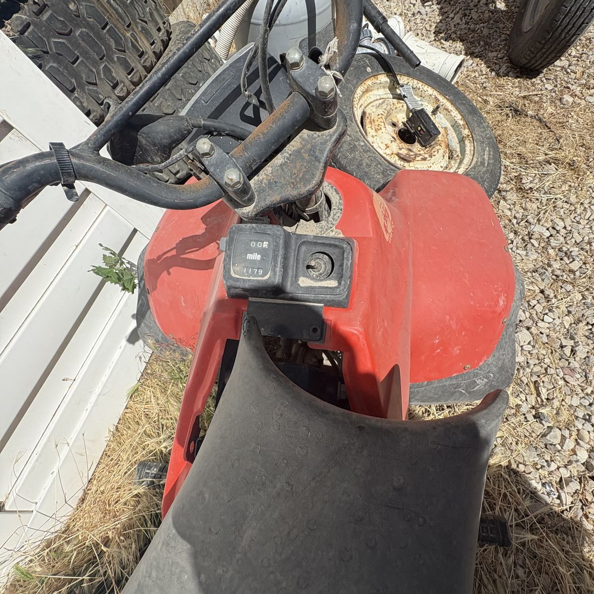 Two older four wheelers and tires