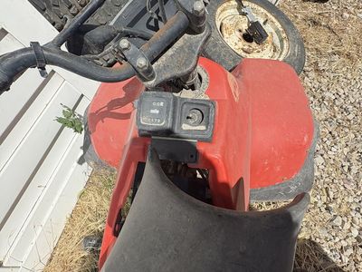 Two older four wheelers and tires