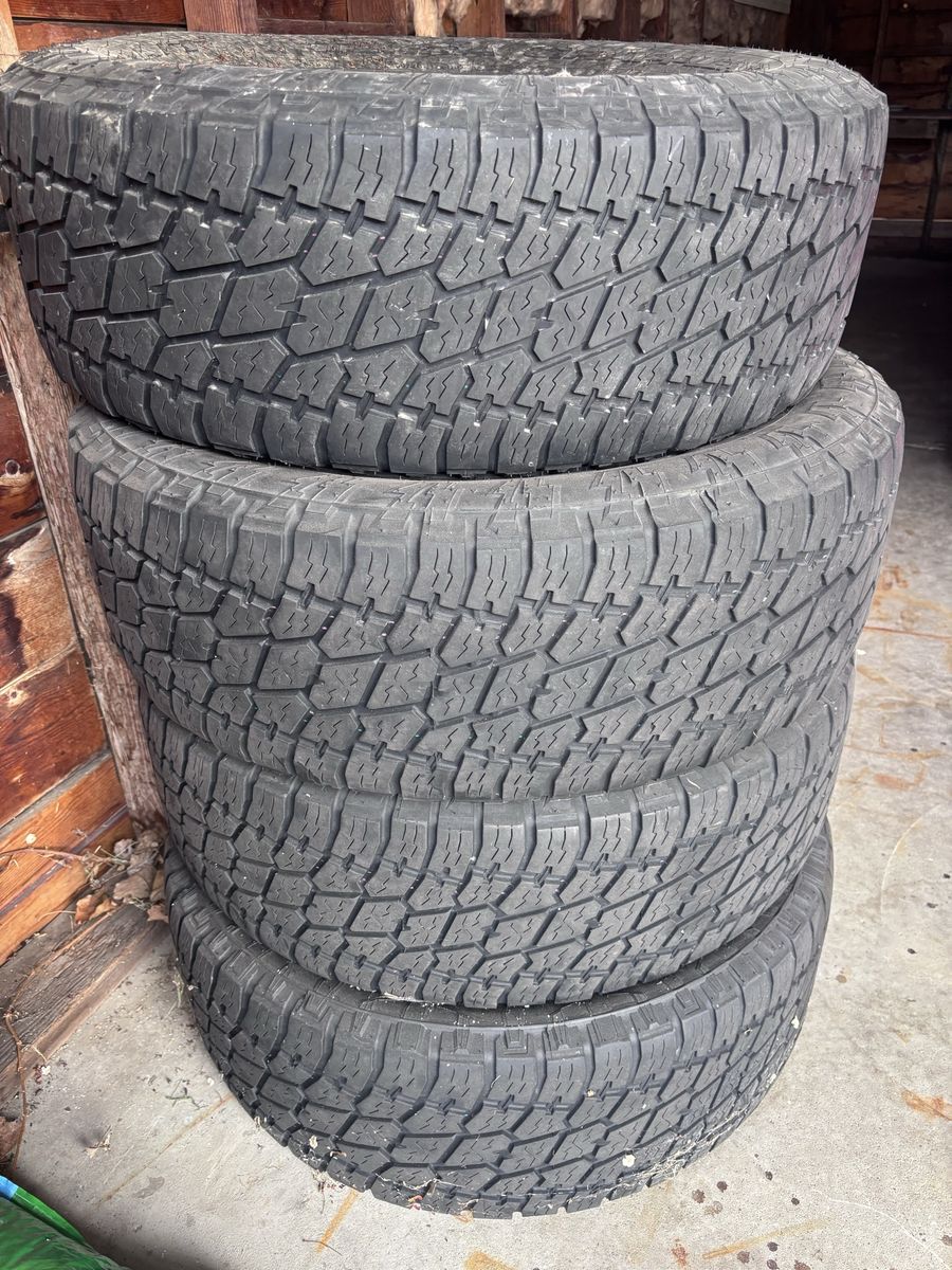 4 Nitto Terra Grappler G2 Tires. LT285/70R17