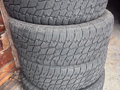 4 Nitto Terra Grappler G2 Tires. LT285/70R17