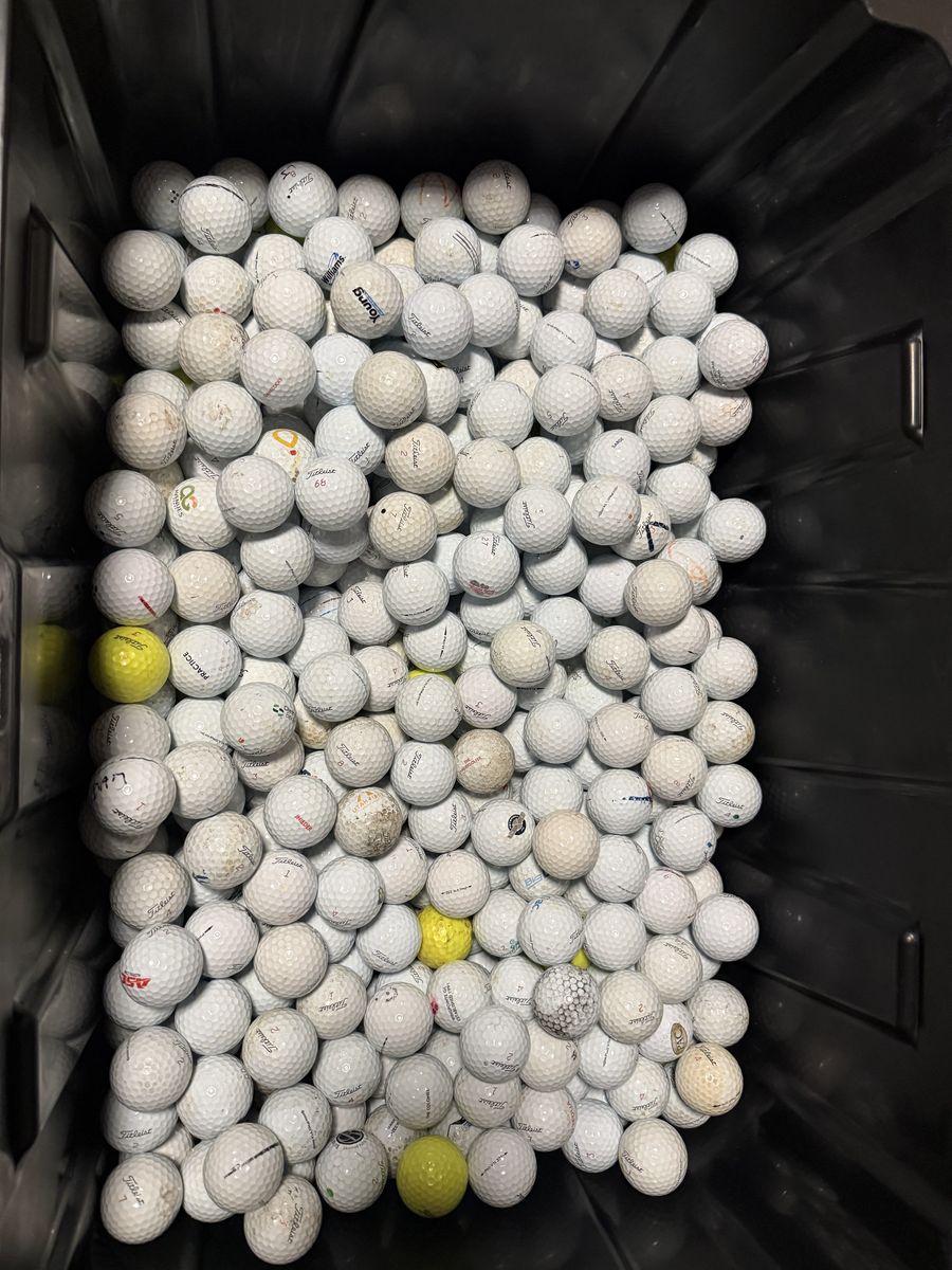 800 ish pro v 1 golf balls.