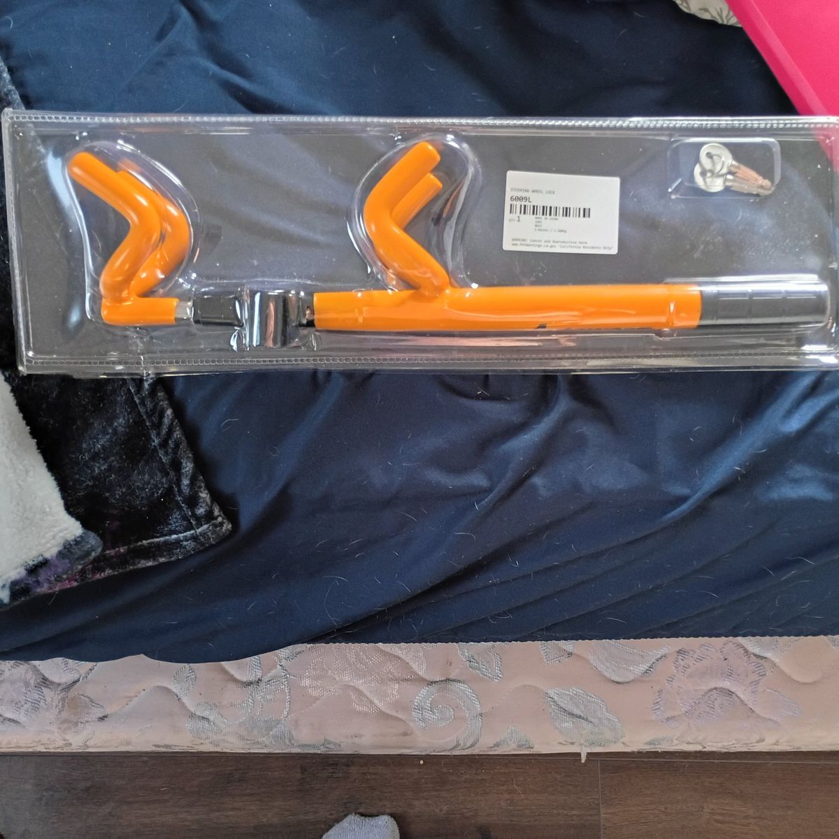 steering wheel lock new un opened.