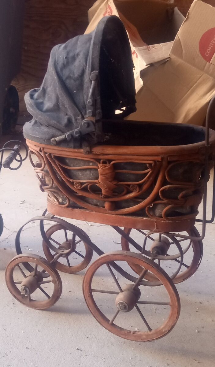 Antique baby buggie toy stroller