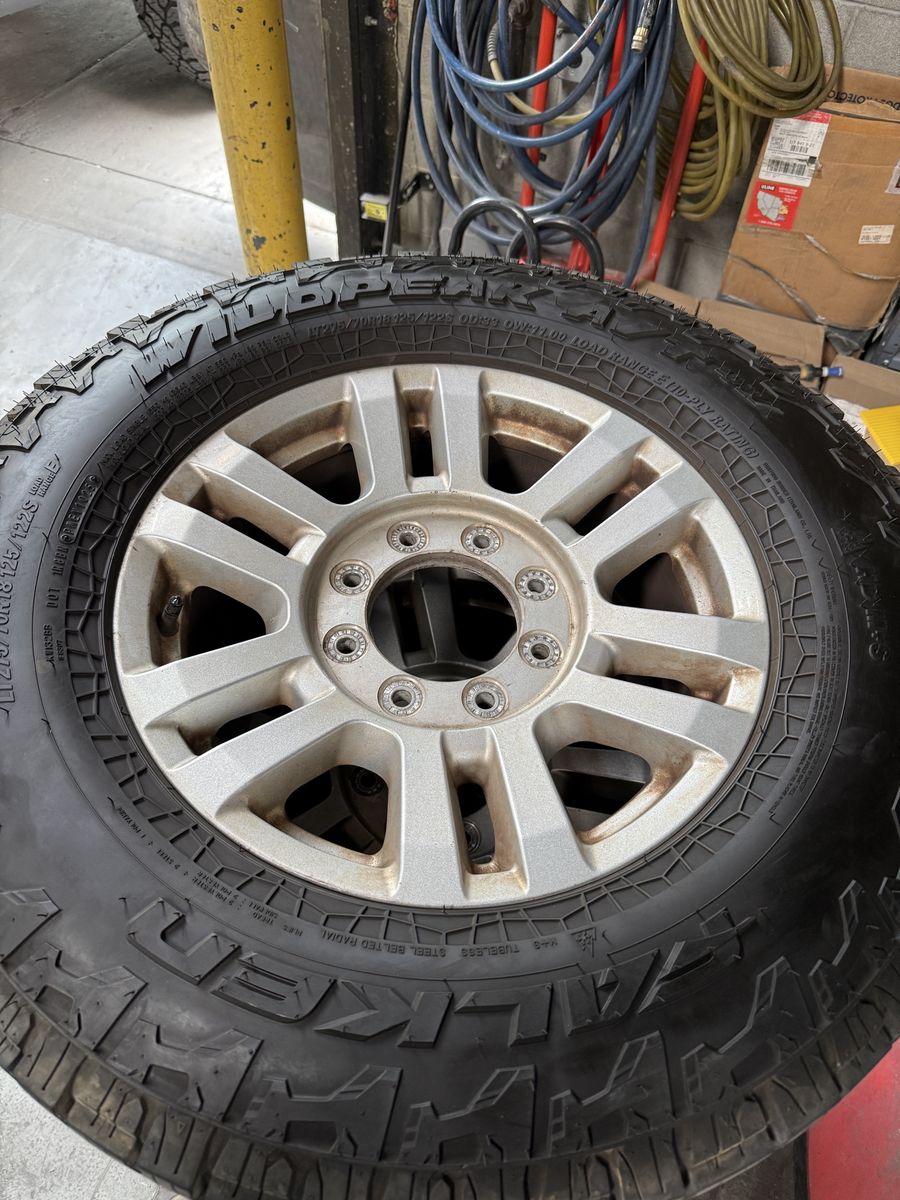 Falken 275/70R18 All-Terrain Tires and Wheels - Set of 4