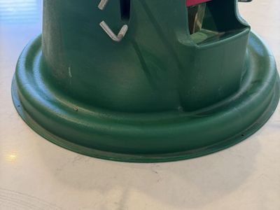 Green Plastic Christmas Tree Stand with Water Reservoir and Metal Bolts
