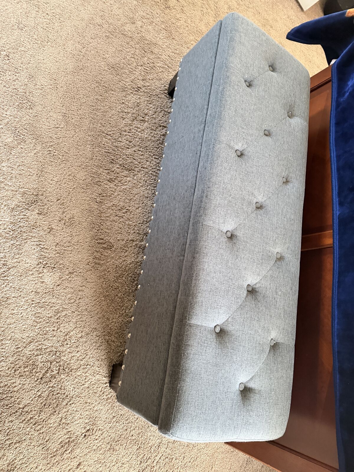 Storage Ottoman - gray fabric tufted