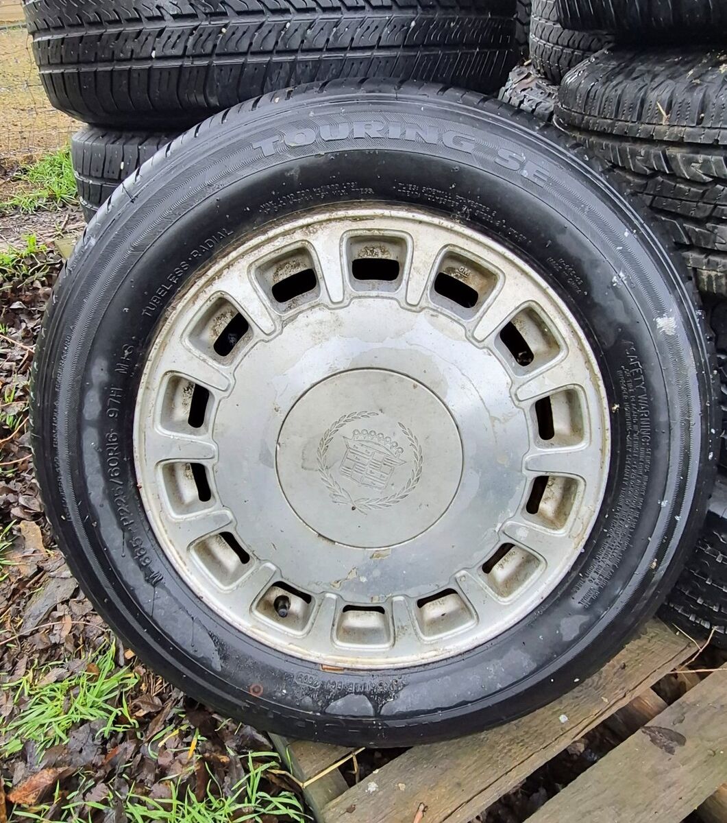 4- 16" 5 bolt Cadillac Rims