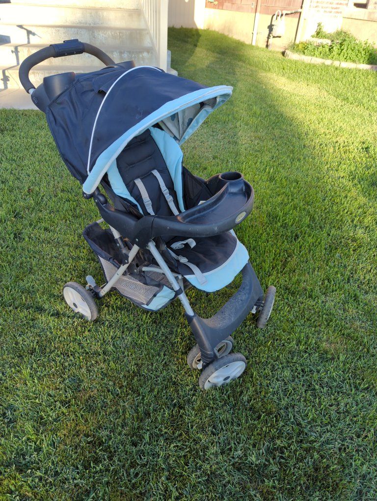 Graco Blue & Black Stroller with Canopy & Cupholder - Used Condition