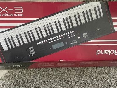Brand new Roland E-X10 Arranger Keyboard/ piano with Music Rest and Power Adapter.