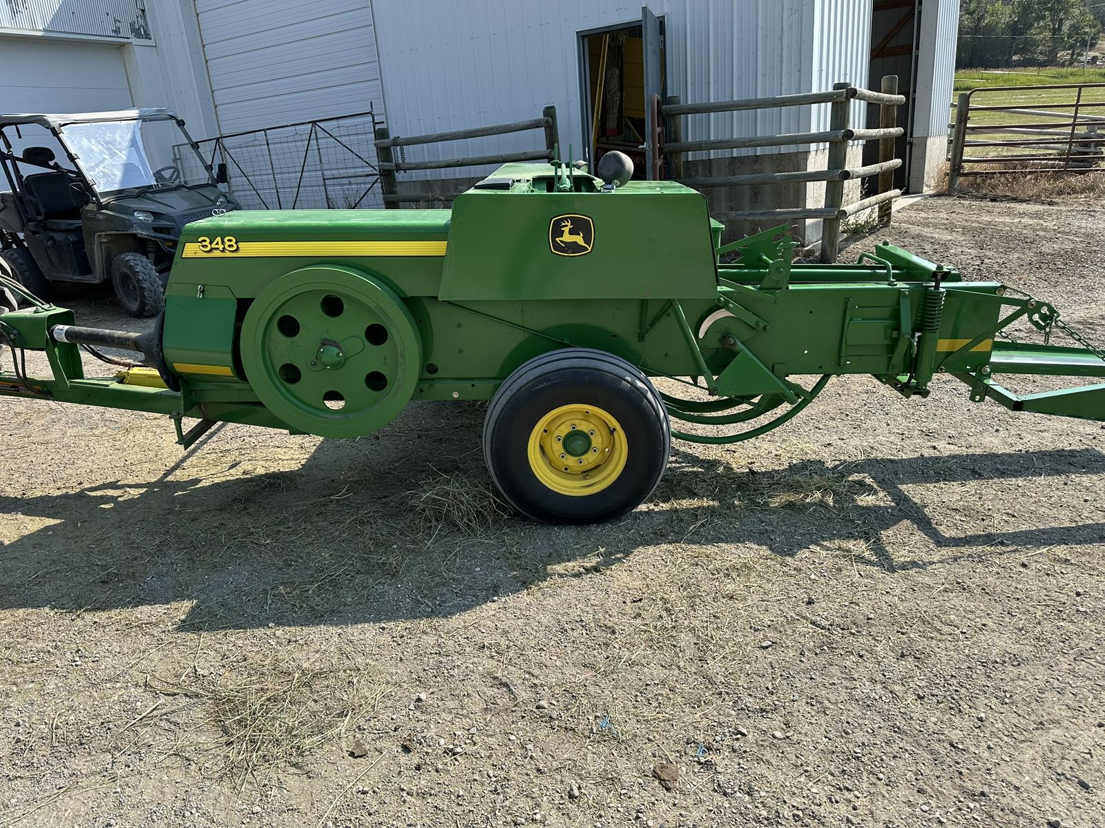 2012 JOHN DEERE 348 SQUARE BALER