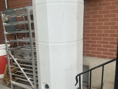 Large 250 gal. Vertical Plastic Water Storage Tank with Spigot
