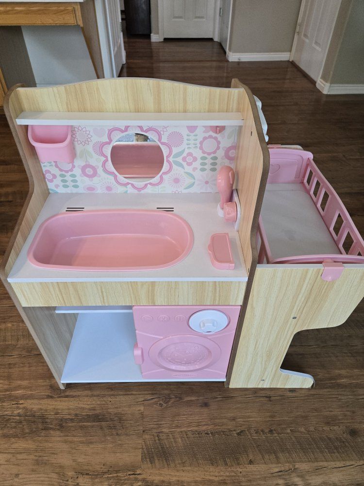 Melissa & Doug Wooden Mine to Love Baby Doll Care Center