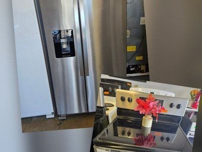 whirpool refrigerator and whirpool electric stove