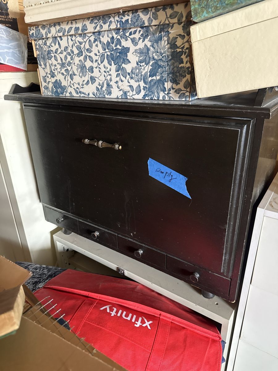 Dark Wood Storage Cabinet with Drop-Down Door and Small Drawers. 33” wide x 16” deep x 25” high