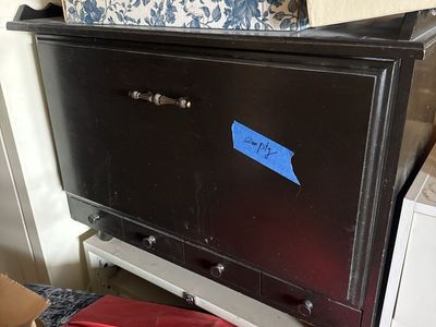 Dark Wood Storage Cabinet with Drop-Down Door and Small Drawers. 33” wide x 16” deep x 25” high