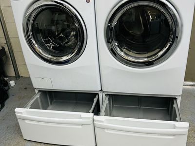 LG washer and dryer set with pedestals