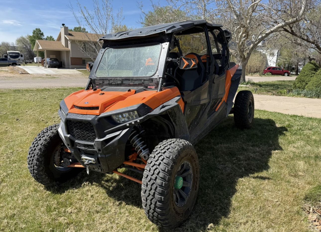 Polaris RZR Side-by-Side UTV - Orange and Black Off-Road Vehicle