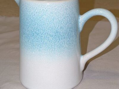 Teleflora Pitcher vase for flowers.
In excellent