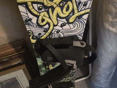 Rossignol R 35 Youth Snowboard with Bindings Used