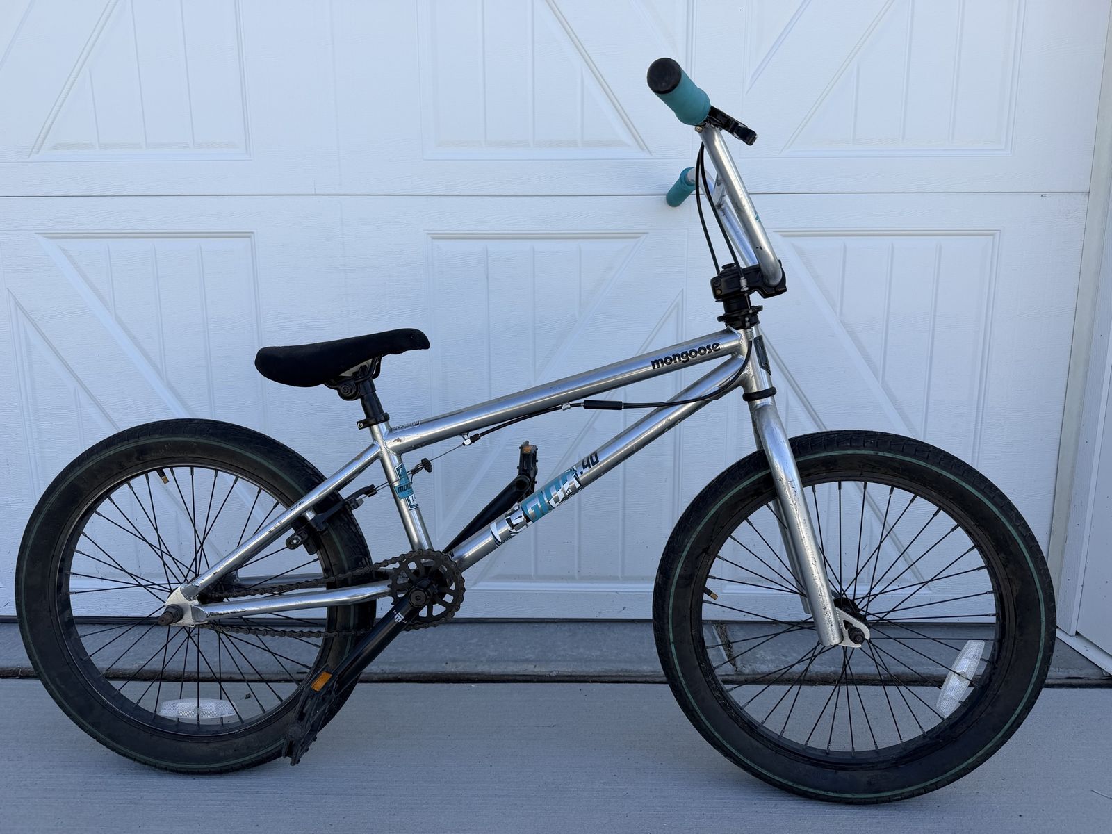 Mongoose Legion L40 BMX Bike - Silver with Teal Grips - Good Condition