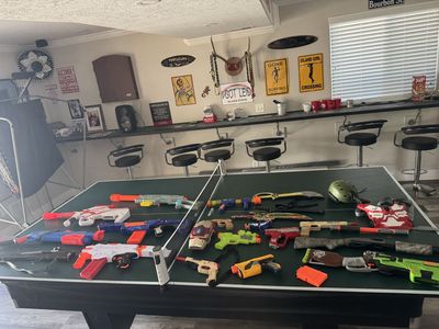 Toy and Nerf guns and swords