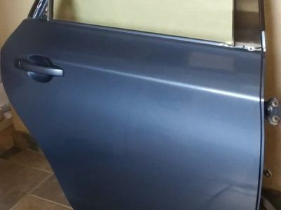 Subaru Door Impreza 2.5i sedan rear passenger complete with interior panel and window glass blue