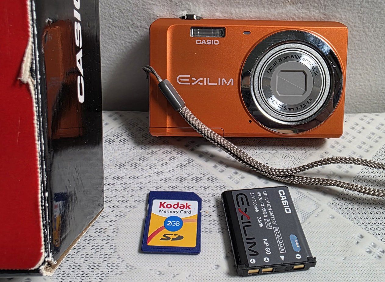 Casio Exilim EX-ZS5 Orange 14.1MP 5x Optical Zoom Digital Camera with Box and Accessories