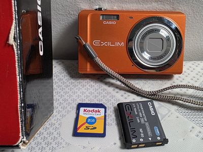 Casio Exilim EX-ZS5 Orange 14.1MP 5x Optical Zoom Digital Camera with Box and Accessories