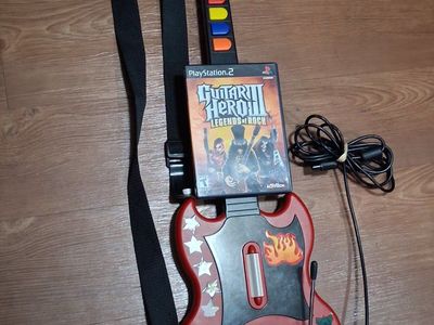 Guitar Hero III Legends of Rock PlayStation 2 Game with Red SG Guitar Controller