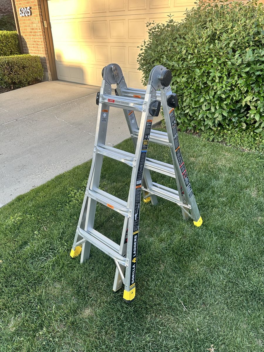 14 ft Gorilla Ladder, aluminum, multi-position and 300 lbs load capacity, used only one time!