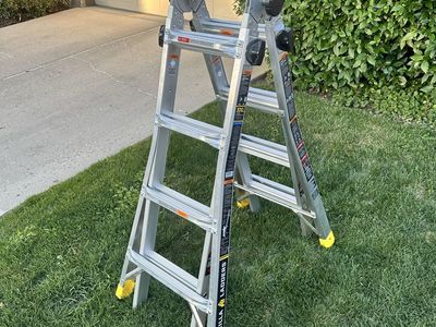 14 ft Gorilla Ladder, aluminum, multi-position and 300 lbs load capacity, used only one time!