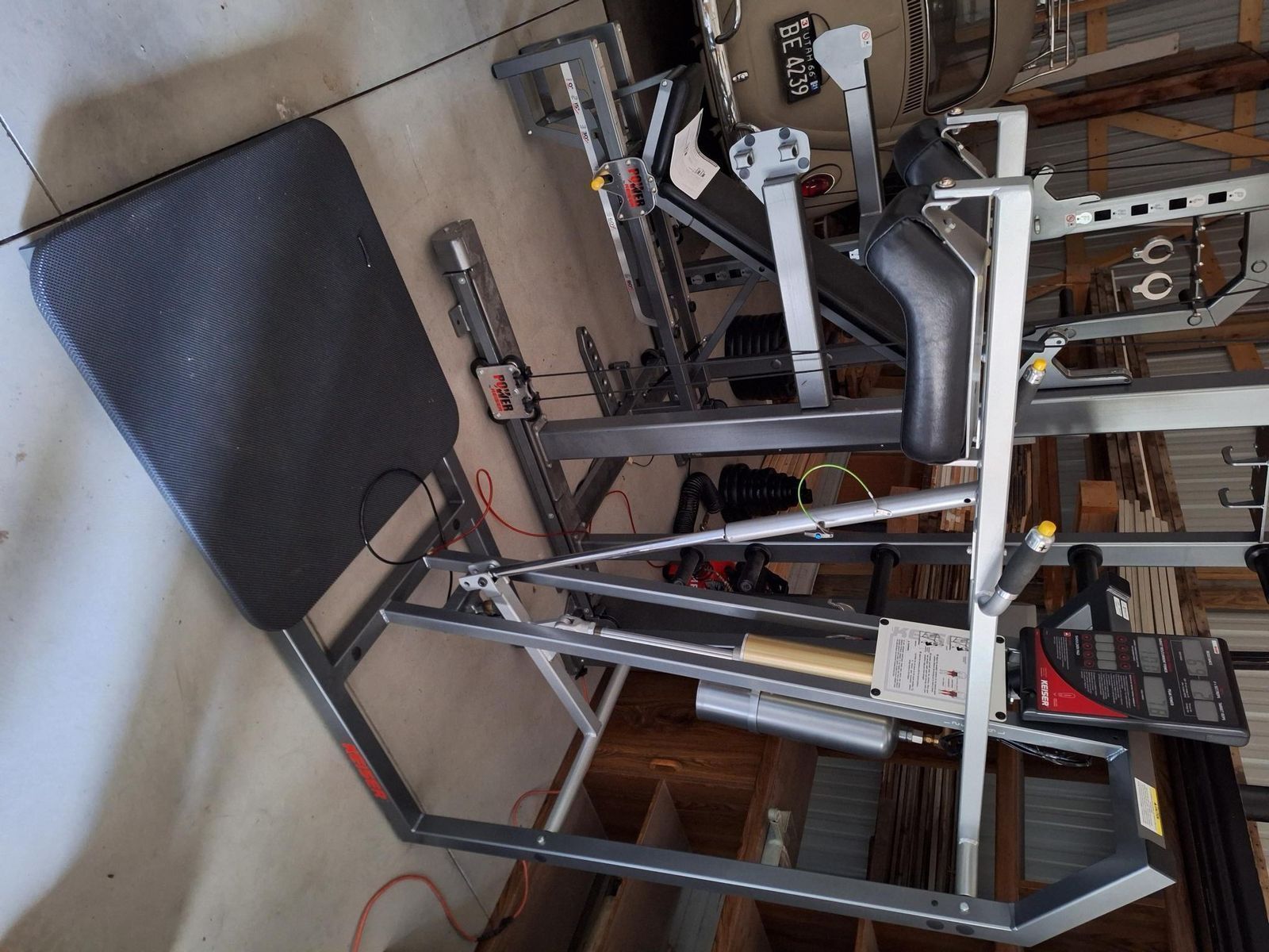 Keiser Squat Machine plus 9' Pneumatic Half Rack with Ivanko Plates