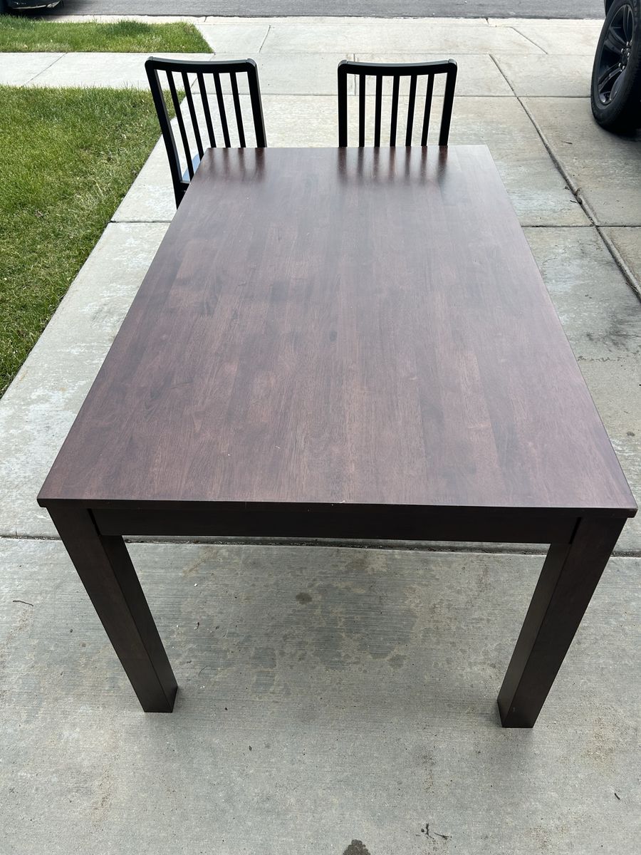 IKEA Dining Table - Dark Wood Finish (2 Chairs included) measures 35x60