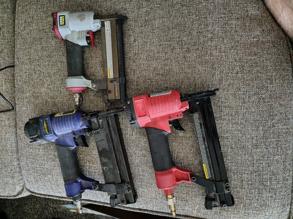 set of 3 different sized pneumatic nailers