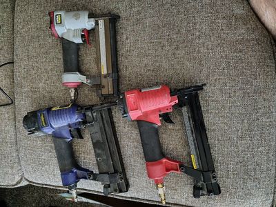 set of 3 different sized pneumatic nailers