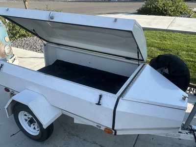 White Enclosed Utility Trailer with Hinged Lid and Tongue Storage Box