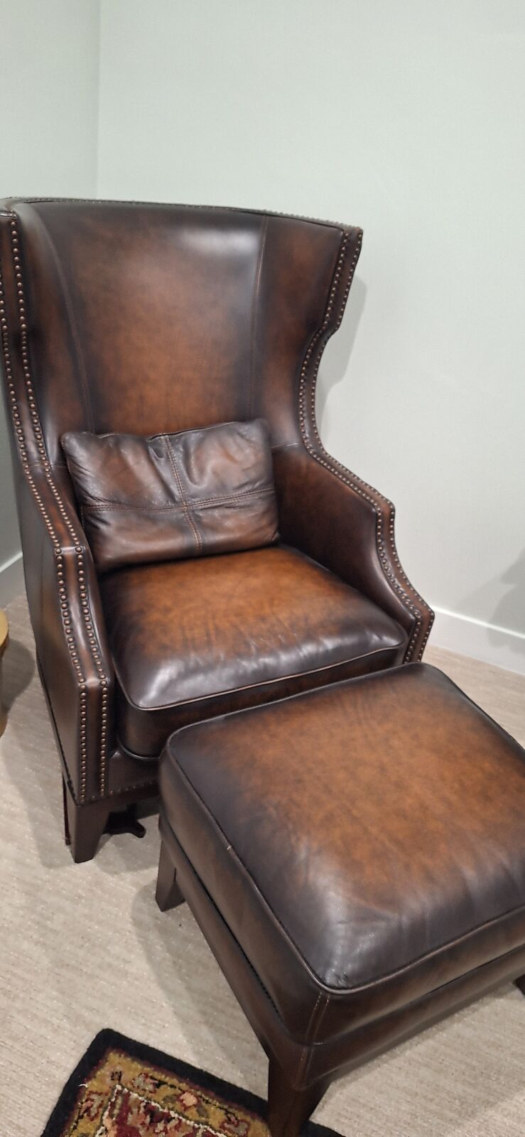 Genuine Leather Highback Armchair and Ottoman