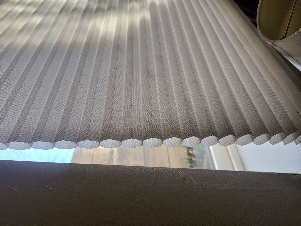3 Honeycomb cellular shades from 55.75” W x 35” H windows; $10 each.