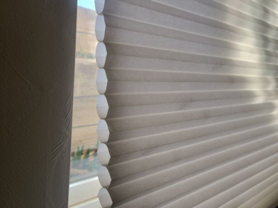 3 Honeycomb cellular shades from 55.75” W x 35” H windows; $10 each.