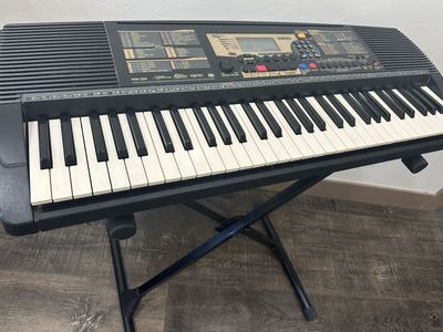 Yamaha keyboard with stand