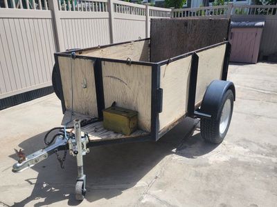 Utility Trailer with Folding Gate - Great for Hauling, Moving, and DIY Projects needs work has rust. Axel and tires are good.