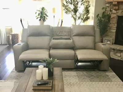 2 sets Tan Reclining Loveseat with Drop-Down Table & Cup Holders - Two Excellent Condition they are 84 inches in length.