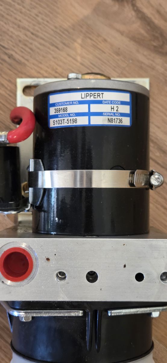 Lippert pump assembly for rv hydraulic leveling