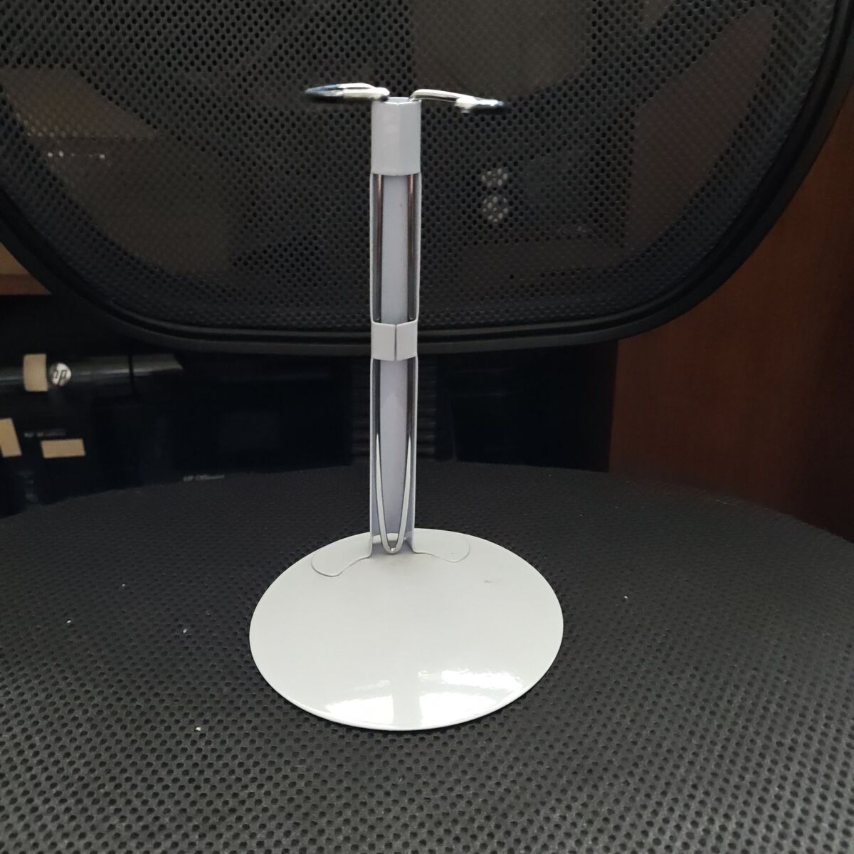 porcelain doll stand
